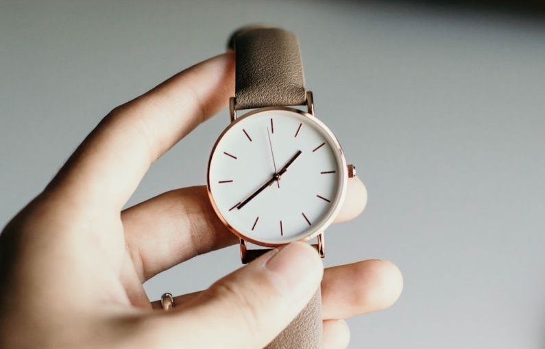 Watch - person holding analog watch