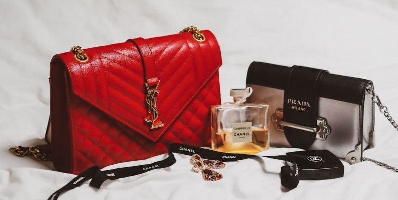 Luxury Shopping - red and black leather handbag